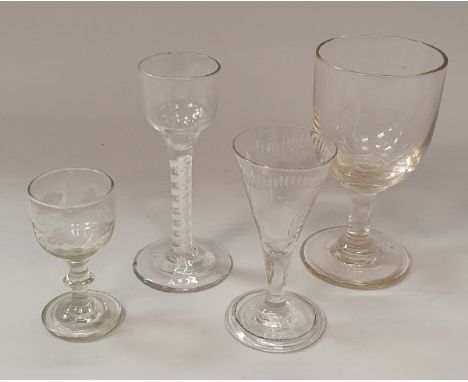 An 18th Century wine glass with ogee bowl on a plain stem with double series opaque twist decoration raised on a circular foo