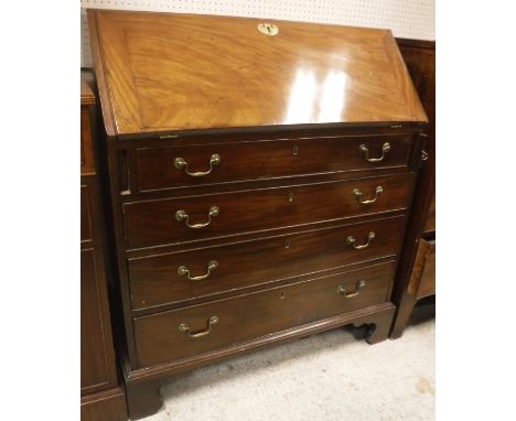 A George III mahogany bureau with sloping fall front over four long drawers, together with a 19th Century mahogany fold over 