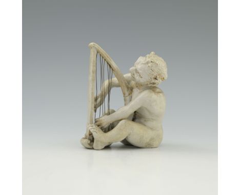 Robert Wallace Martin for Martin Brothers, a stoneware musical imp figure, 1906, modelled playing the harp, cream glazed,  in