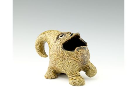 Robert Wallace Martin for Martin Brothers, a novelty stoneware characterful beast spoon warmer, 1882, modelled as a zoomorphi