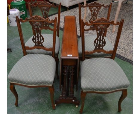 A Victorian mahogany Sutherland table, turned legs, ceramic casters; a set of four late Victorian dining chairs, pierced and 