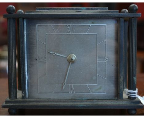 An Art Deco style mantel clock, silvered dial, Roman numerals