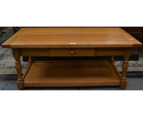 A large light oak coffee table, by Brights of Nettlebed