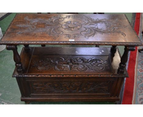 A late 19th/early 20th century oak monks bench, 106cm wide