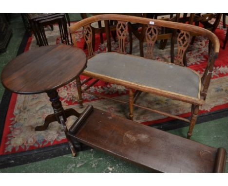 An Edwardian mahogany two seater bench; an oak circular tilt top tripod table; a mahogany stool (3)