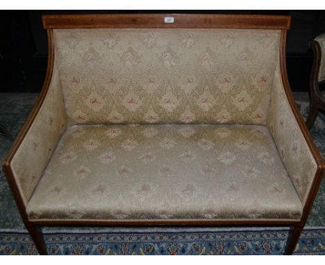 An Edwardian crossbanded mahogany salon sofa, brass casters