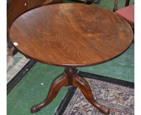 A George III mahogany tripod occasional table, circular tilting top, turned pillar, cabriole legs, 71cm high, 89cm diameter, 