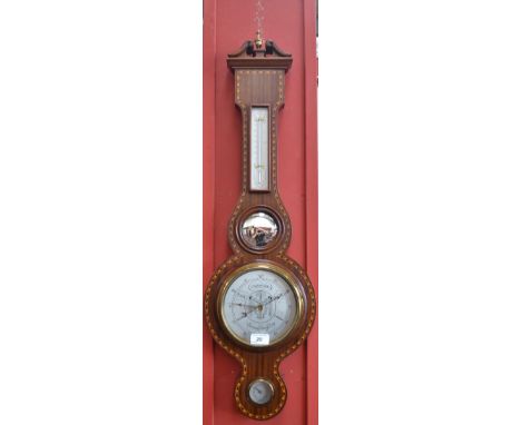 A mahogany cased banjo barometer, brass urnular finial and swan neck pediment, silvered dial with thermometer, hygrometer and