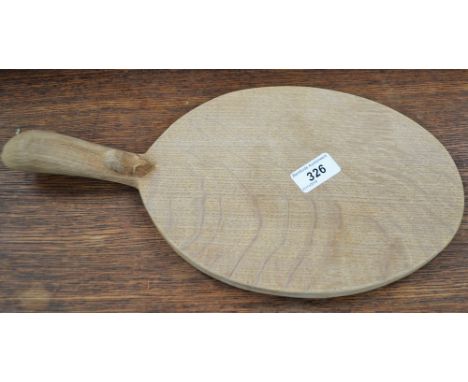 A light oak Mouseman cheese board