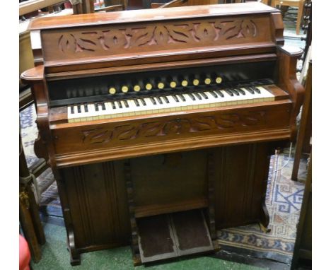 A floor standing harmonium, S Churchill, 66 Park Street, Bristol, 114cm wide