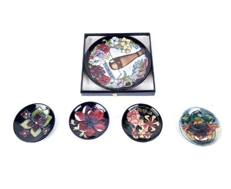A Moorcroft Centennial circular plate, designed by Rachel Bishop, limited edition 252/750, 22cms diameter, with box and certi