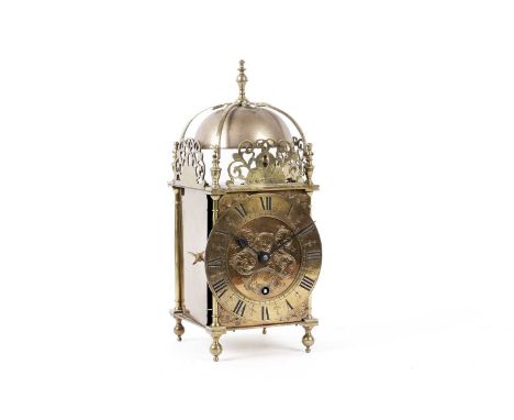 A German brass lantern clock, by Winterhalder &amp; Hofmeier, the dome top within pierced and dolphin engraved side panels, a