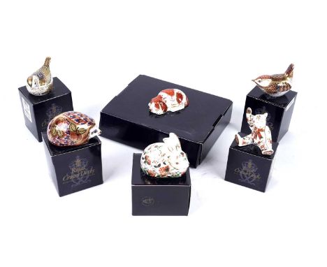 A collection of Royal Crown Derby ceramic paperweights, including: a Collectors Guild Exclusive 'Meadow Rabbit'; a Collectors