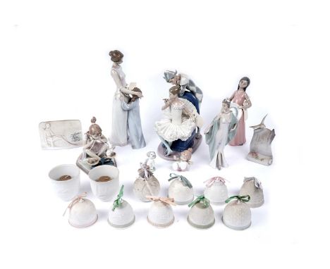 A collection of Lladro and Nao figures, including: a Lladro ‘Collector’s Society’ plaque; a selection of Lladro Christmas bel