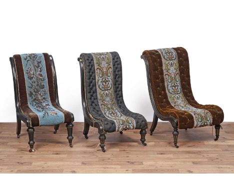 Three similar late Victorian ebonised and beadwork nursing chairs, two with button backs and one with parcel gilt decoration,