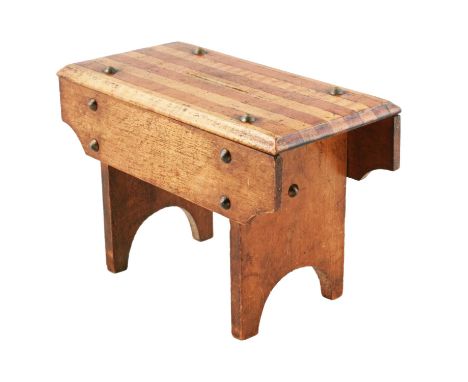A Victorian miniature beechwood and brass studded stool or cracket money box, with mahogany and satin birch top incorporating
