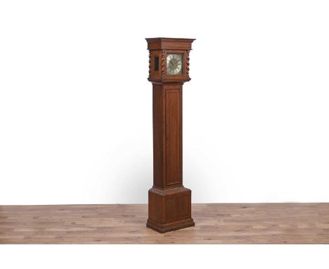 An early 20th Century inlaid and banded mahogany longcase clock, the brass Roman dial with silvered chapter ring and floral d