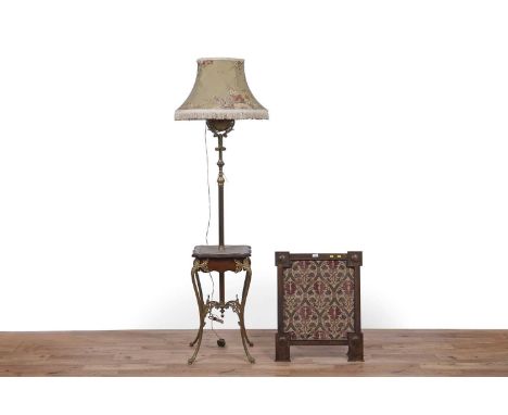 A mid-20th Century mahogany and brass standard lamp, converted from oil to electric, with foliate decoration throughout, 173c