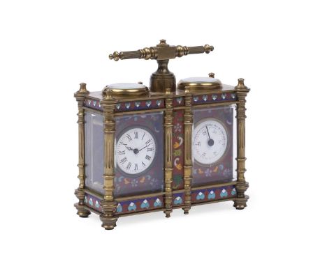 An early 20th Century enamelled brass clock and barometer desk compendium, the white enamel dials within cases enamelled with