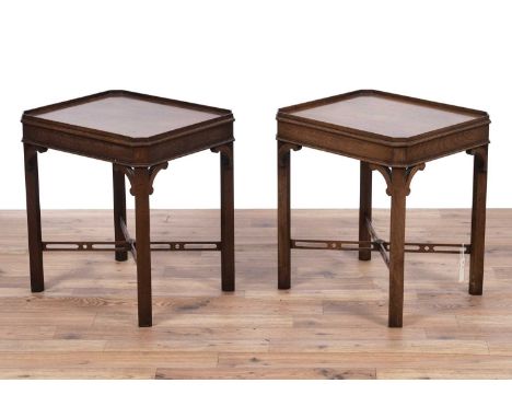 A pair of 20th Century mahogany Chippendale style wine table/lamp stands, the gallery top and legs with canted corners, joine