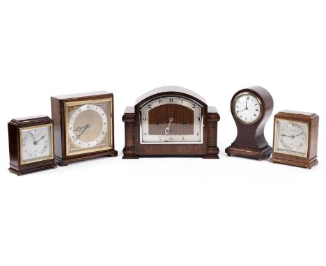 An Elliot of London mantle clock, retailed by The Northern Goldsmiths Co, Newcastle-upon-Tyne, 19 x 20cms high; two smaller E