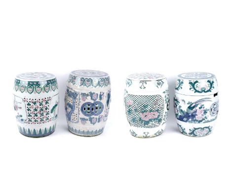 Four 20th Century Chinese ceramic garden seats, of various designs, each with pierced and enamelled decoration, in shades of 