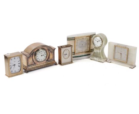 An Elliot onyx mantle clock, the square silvered dial with gilt Arabic numeral and baton hour markers, the dial signed 'T.A. 
