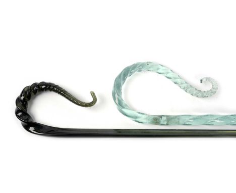 A spiral twist glass walking stick, in light blue, with scrolling handle, 102cms long; together with another glass walking st