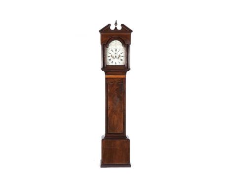An early 19th Century mahogany 8-day longcase clock, the arched painted dial having Roman and Arabic numerals, a subsidiary d