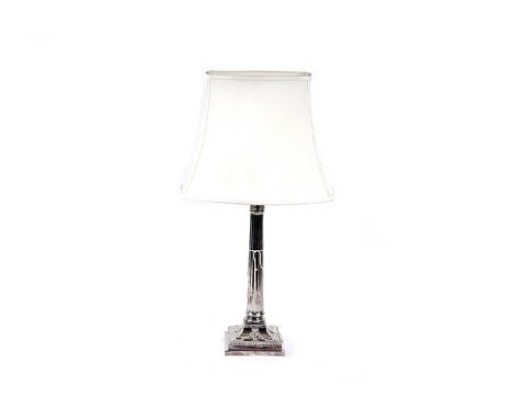 A silver plated table lamp, on Corinthian column and square stepped base, with shade, 49cms without shade.