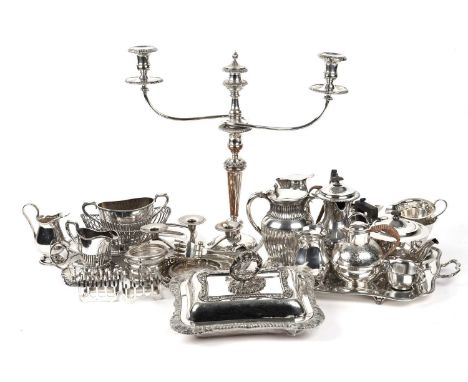 A selection of silver plated wares, including: a Victorian twin branch candelabra; an entree dish and cover; a pair of five b
