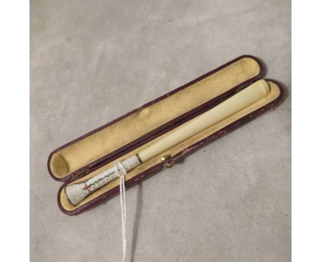 A 1920s Austrian silver enamel and Bakelite cased cigarette holder