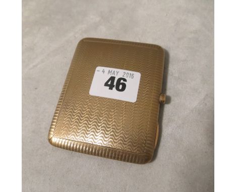 An art deco 9ct gold engine turned cigarette case, 83.4 grams