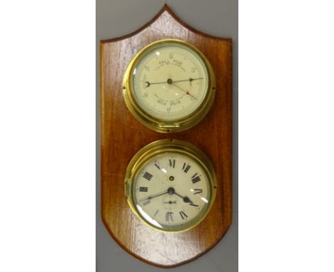 Sestrel brass cased Aneroid Barometer, circular cream dial with red pointer and a bulkhead clock, cream Roman dial with subsi