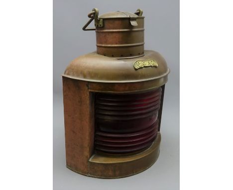 Ship's copper Port lamp, D-shaped body with red glass lens, original burner and chimney, swing handle, H48cm Condition Report