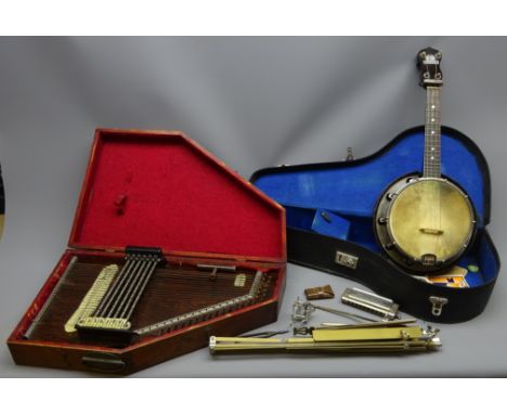 George Formby ukelele, bears signature to the vellum, metal plaque and impressed number C2341, L57cm, cased, a boxed Reichelt