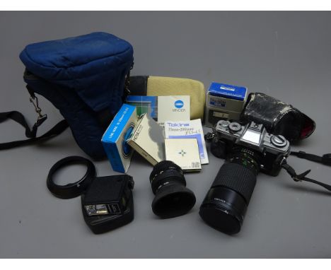 Minolta XG-M 35mm camera with Tokina 35-200mm 1:3.5 - 4.5 lens, carry bag and other accessories Condition Report Click here f