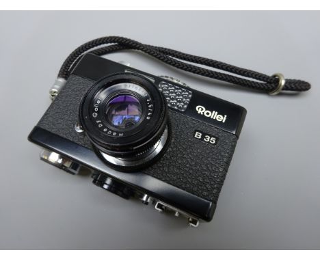Rollei B35 SLR black edition camera, with Triostar 3.5/40 lens and  carry strap  Condition Report appears workingClick here f