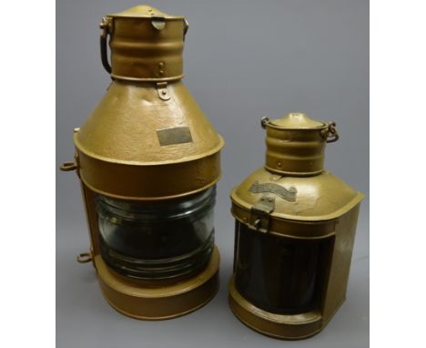 Meteorite ship's Masthead lamp with painted metallic finish, bears plaque No.29781 (lacking burner) H59cm and a similarly pai