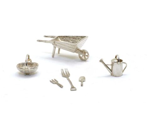 Four novelty silver hare menu holders, London 1996, 3cm high, and a novelty 925 marked 'Owl' bookmark, 9.5cm long, and a mode