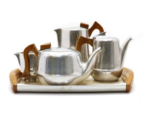 A six piece Picquot ware tea service, comprising teapot, 24cm wide, hot water pot, 19cm high, coffee pot, 16cm high, cream ju