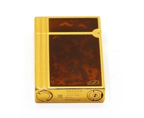 A S.T. Dupont gilt metal lighter, having brown Laque de Chine and marked S.T. Dupont Paris to base, Ref:0018536, Serial No. 1