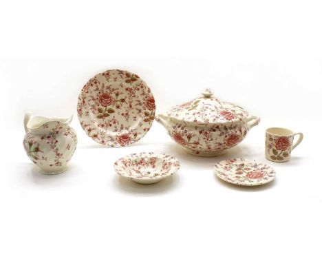 A Johnson Brothers tea and dinner service, in the Rose Chintz pattern, comprising 8 large plates, 8 soup dishes, 8 small bowl