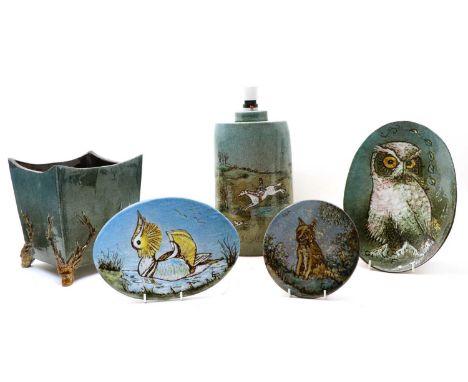 A quantity of Islay studio pottery, to include a table lamp depicting hunting scenes, three jardinieres, two with stags head 