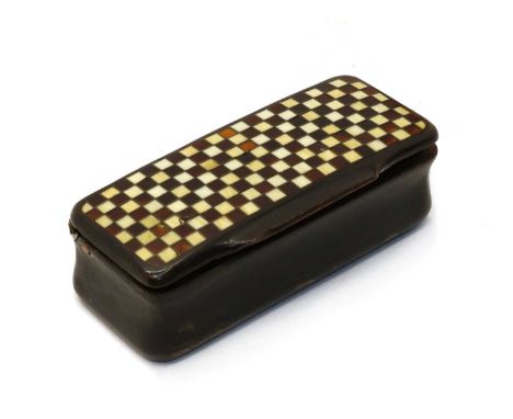 An antique tortoiseshell ivory and brass checkerboard snuff box, c.1850, 9.5cm long, 4cm deep, 3cm highCondition report: in o