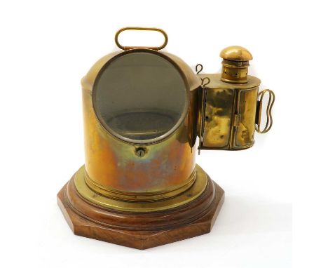 A brass binnacle compass, with a gimbal mount and attached oil lamp on a turned, wooden mount, stamped 'DL', 28cm highProvena