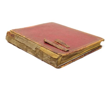 A Victorian album of embossed letter crests, painted and stuck in, comprising: an illuminated first page 'Album' followed by 