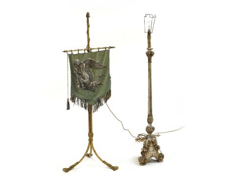 A carved and silvered standard lamp, with mirrored panels, 150cm high approx, and a brass pole screen/standard lamp, with a b
