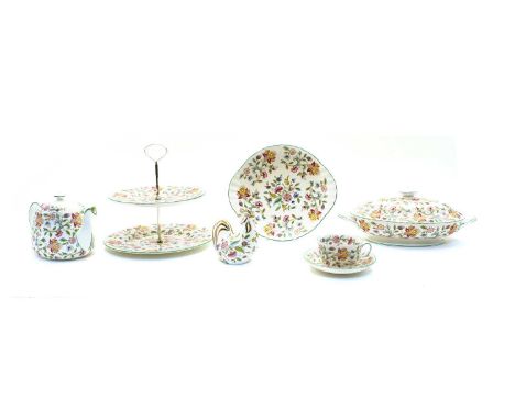 A large Minton Haddon hall dinner service, for eight settings, including tea cups and saucers, a tea pot, a two tier cake sta