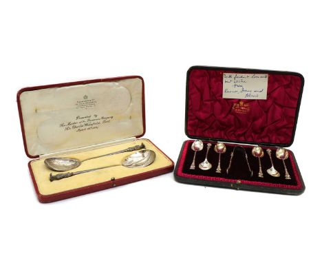 A pair of cased apostle spoons, by S Blanckensee &amp; Son Ltd, Birmingham 1918, 18.3cm long, together with a cased set of si